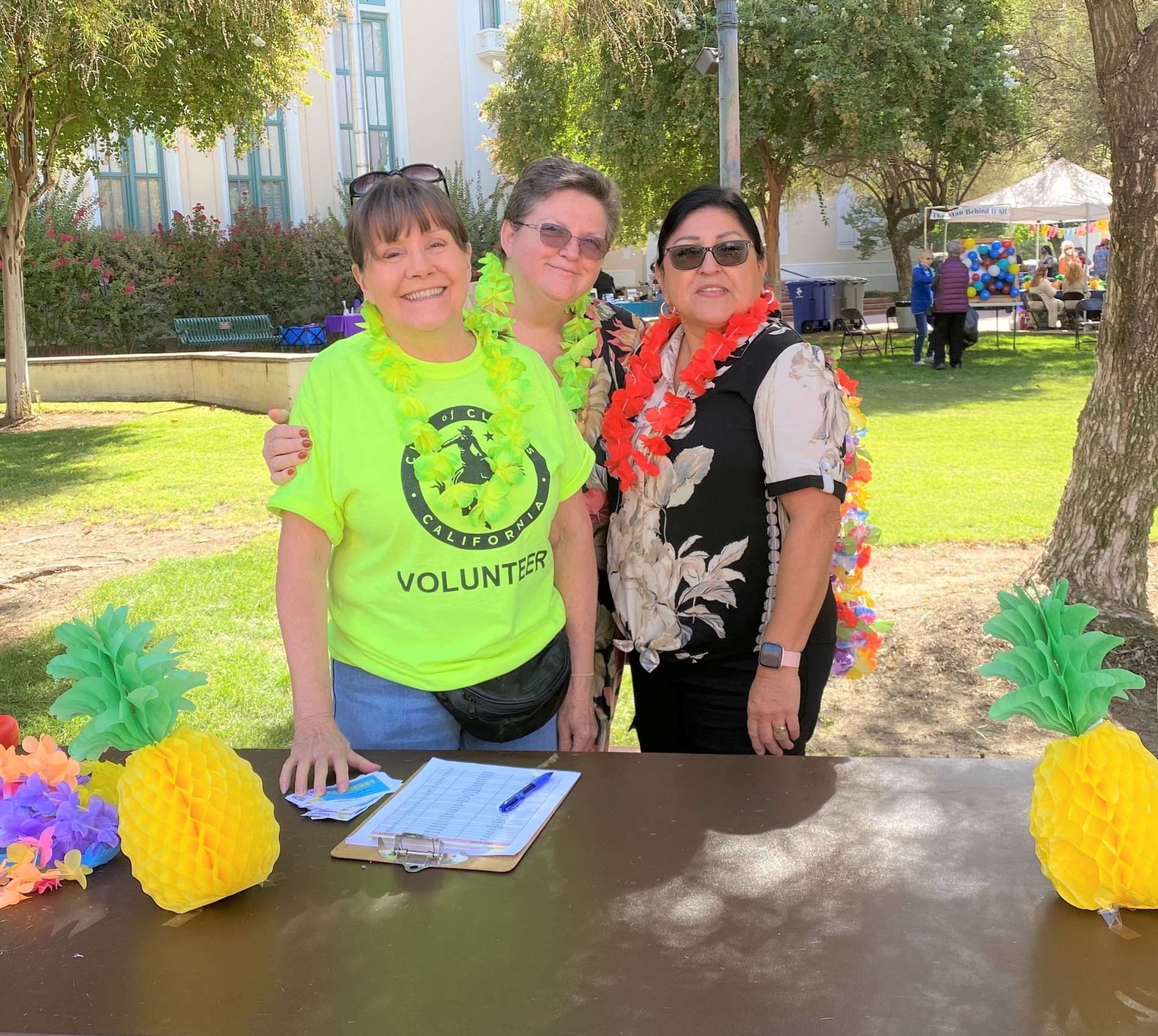 Three volunteers in a group at the Clovis Senior Center